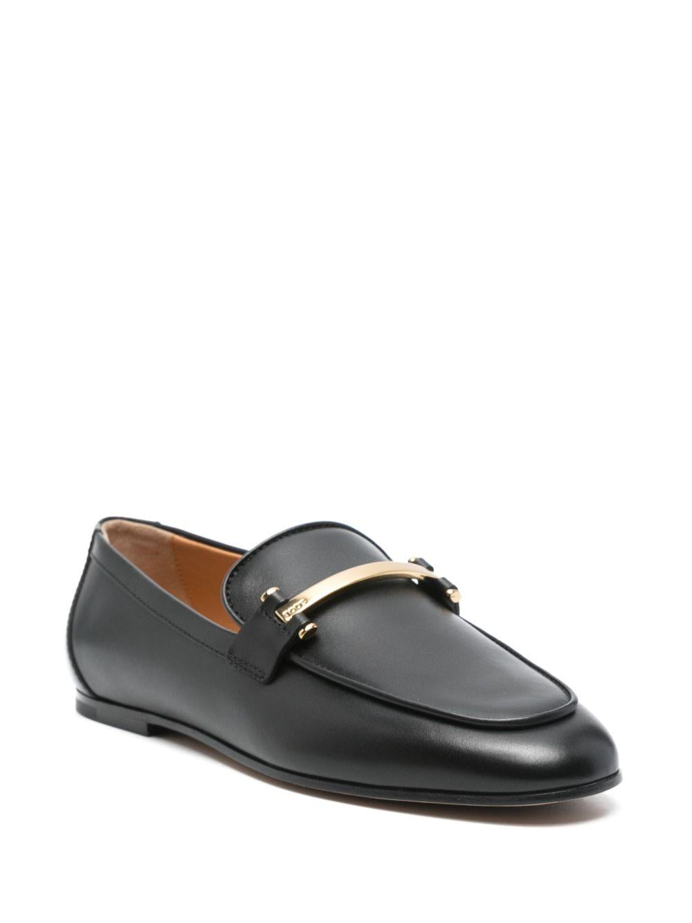 Mocassini in pelle con barra metallica in nero Tod's - donna 