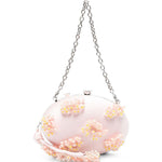 Clutch in raso rosa con decorazioni floreali 