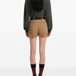 Shorts in lana con fodera a vista in marrone 