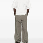 T-shirt con stampa del logo in bianco Oamc peacemaker - uomo 