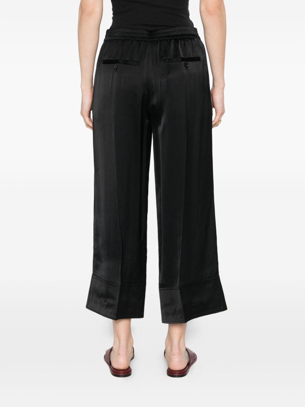 Pantaloni satinati con coulisse in nero Toteme - donna 