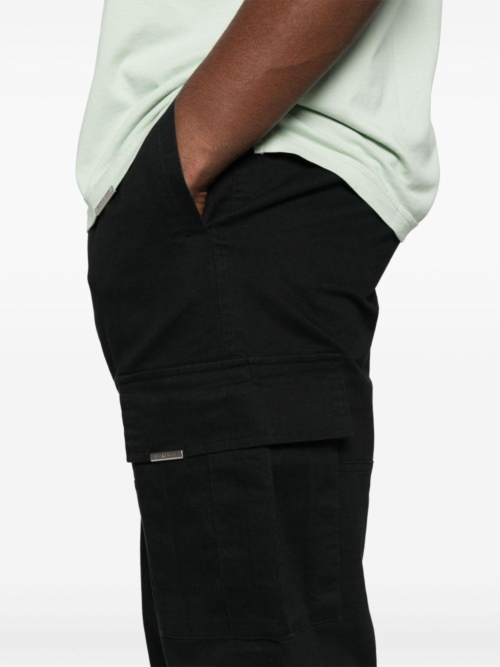 Pantaloni cargo clo in nero Represent - uomo 