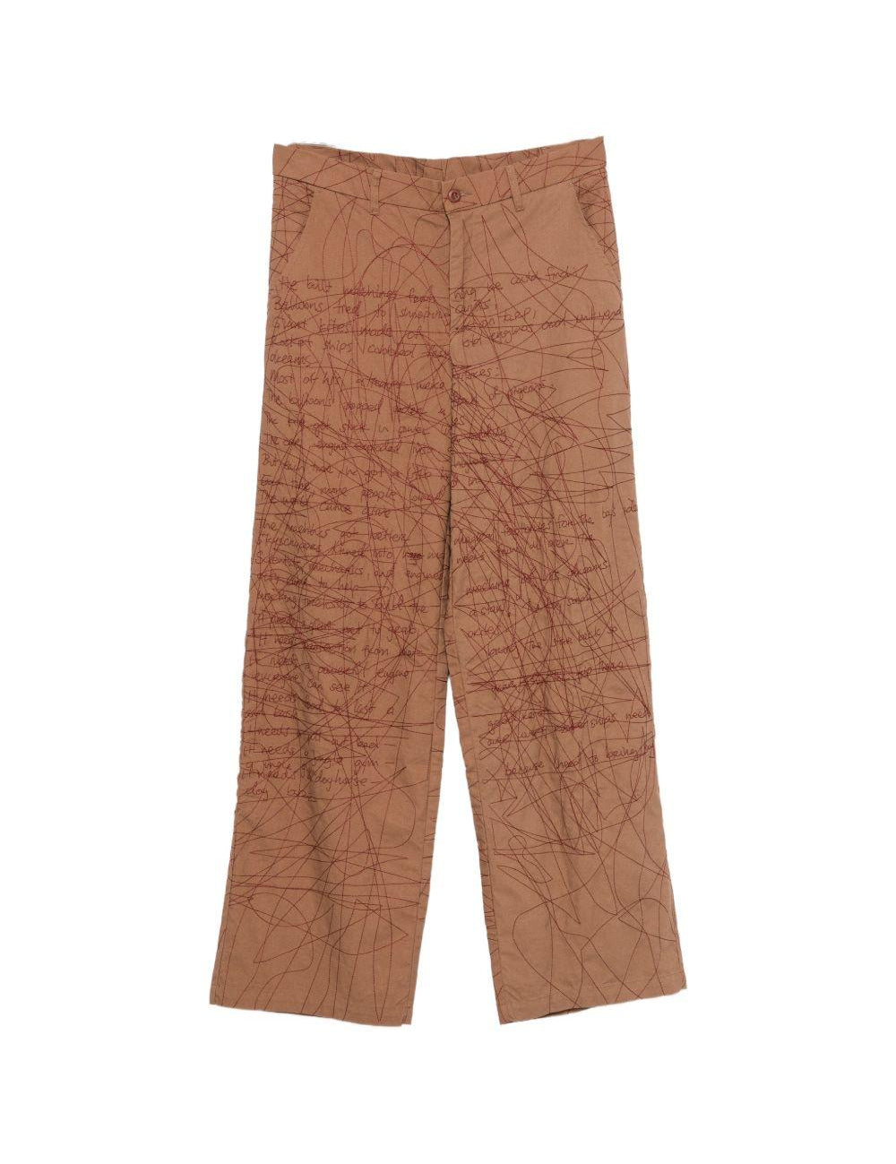 Pantaloni con motivo a scrittura ricamata in marrone Kidsuper - uomo 