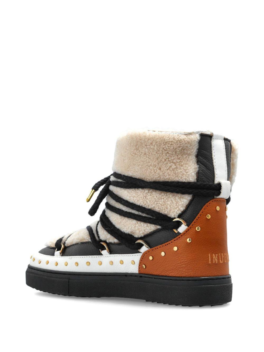Stivali stringati con borchie in beige Inuikii - donna 