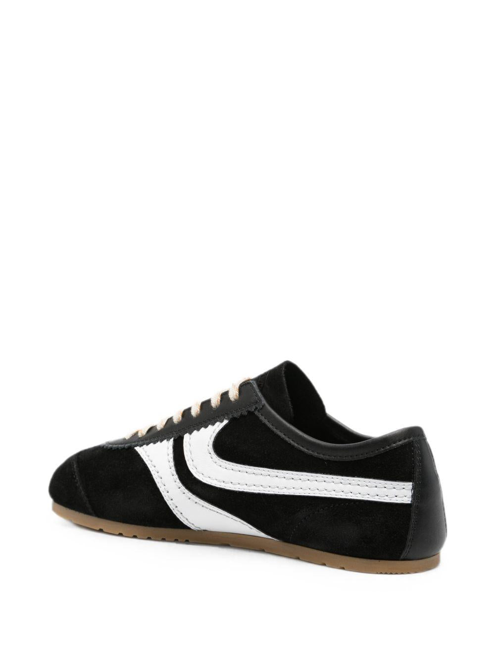 Sneakers a pannelli in pelle in nero 