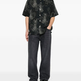 Camicia a maniche corte con fantasia in nero Our legacy - uomo 