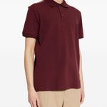 Polo con dettaglio a righe in piquet in rosso Moncler - uomo 