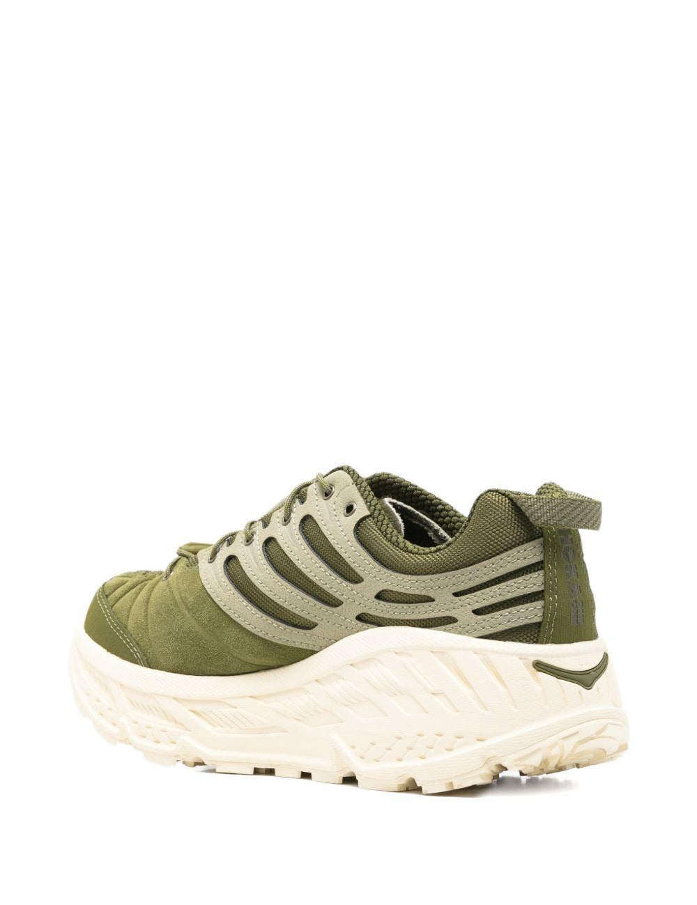 Sneakers con lacci in verde 