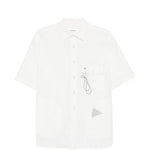 Camicia a maniche corte con moschettone in bainco And wander - uomo 
