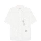 Camicia a maniche corte con moschettone in bainco And wander - uomo 
