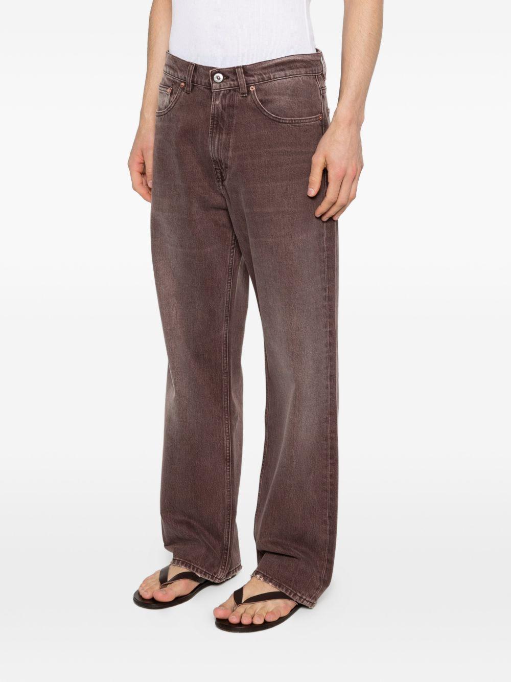 Jeans con effetto schiarito in marrone Our legacy - uomo 