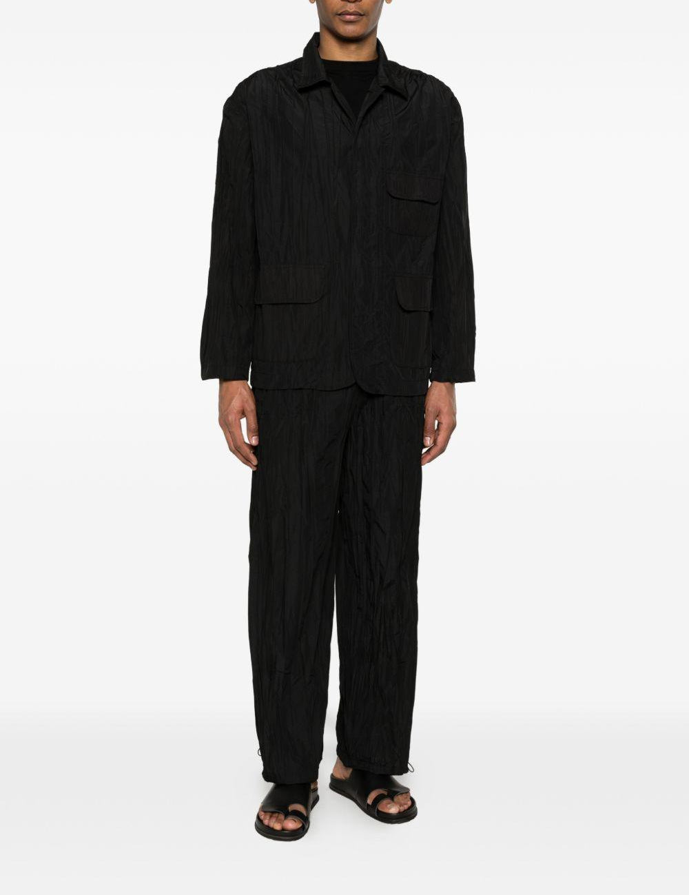 pantaloni plissettati in nero gongdid design - uomo 