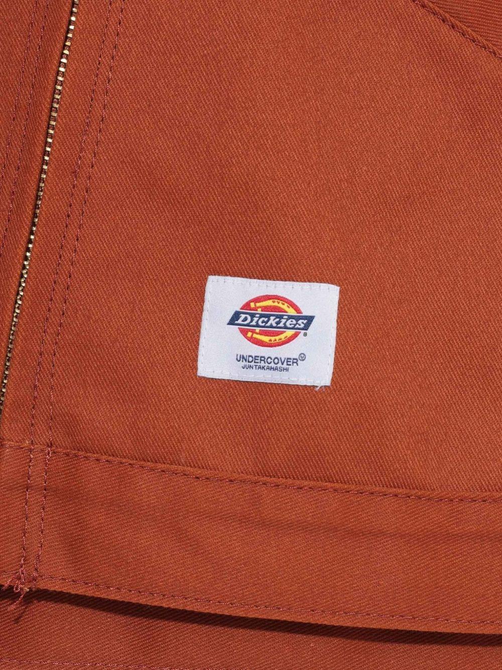 Giacca con zip in arancione Undercover - uomo 