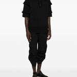 T-shirt con mezza zip e dettaglio a volant in nero Simone rocha - uomo 