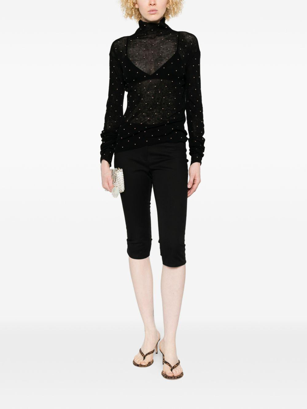 Maglione a collo alto con borchie in nero Rabanne - donna 