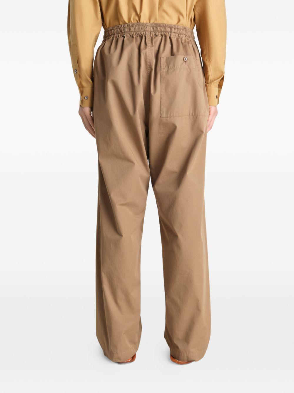 Pantaloni con coulisse in beige LEMAIRE - uomo 