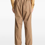 Pantaloni con coulisse in beige LEMAIRE - uomo 