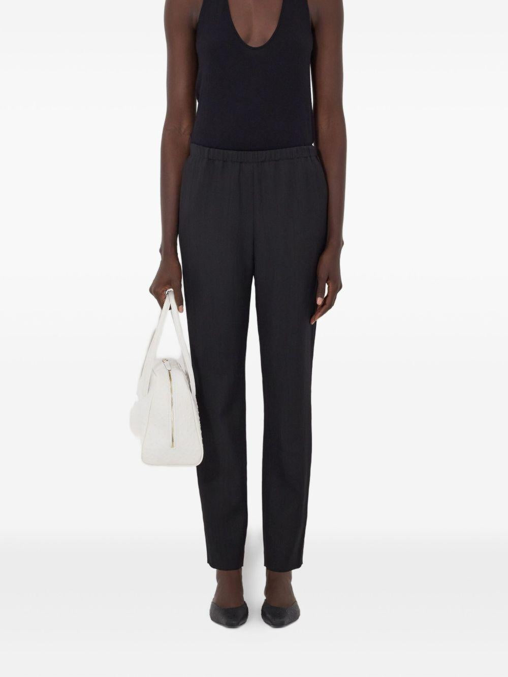 Pantaloni elasticizzati Scot in nero Loulou de saison - donna 