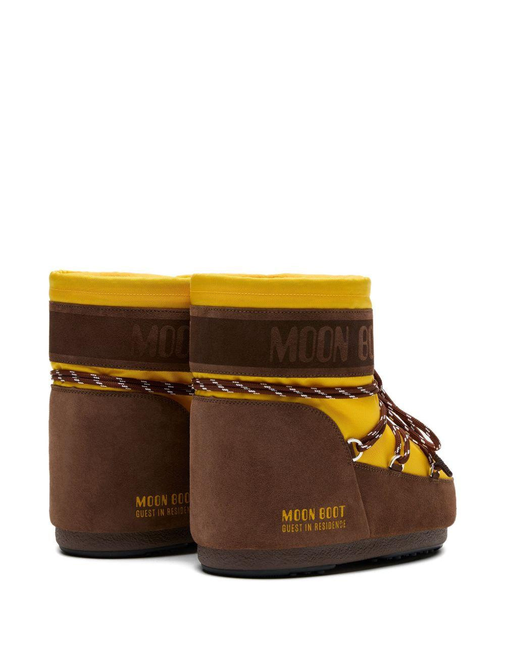 Stivali da neve con lacci e logo in giallo e marrone Moon boot x guest in residence - donna 