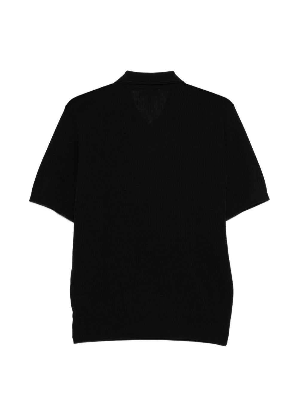 Polo a coste con zip in nero Kangra - uomo 