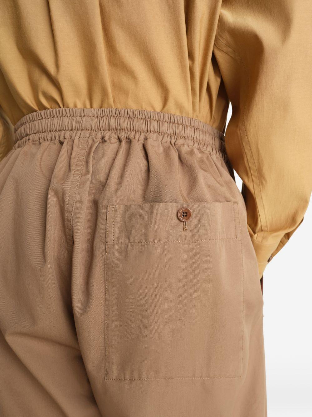 Pantaloni con coulisse in beige LEMAIRE - uomo 