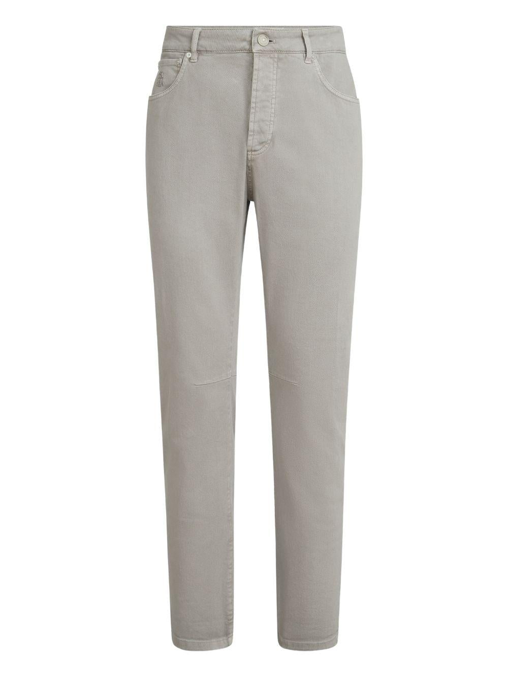 Jeans a cinque tasche con chiusura a bottone in grigio Brunello cucinelli - uomo 