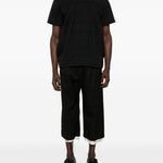 T-shirt girocollo a pannelli in nero Comme des garcons homme plus - uomo 