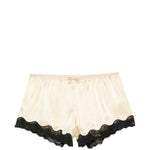 Pantaloncini con bordo in pizzo e fiocco decorativo in beige Rotate x love stories - donna 