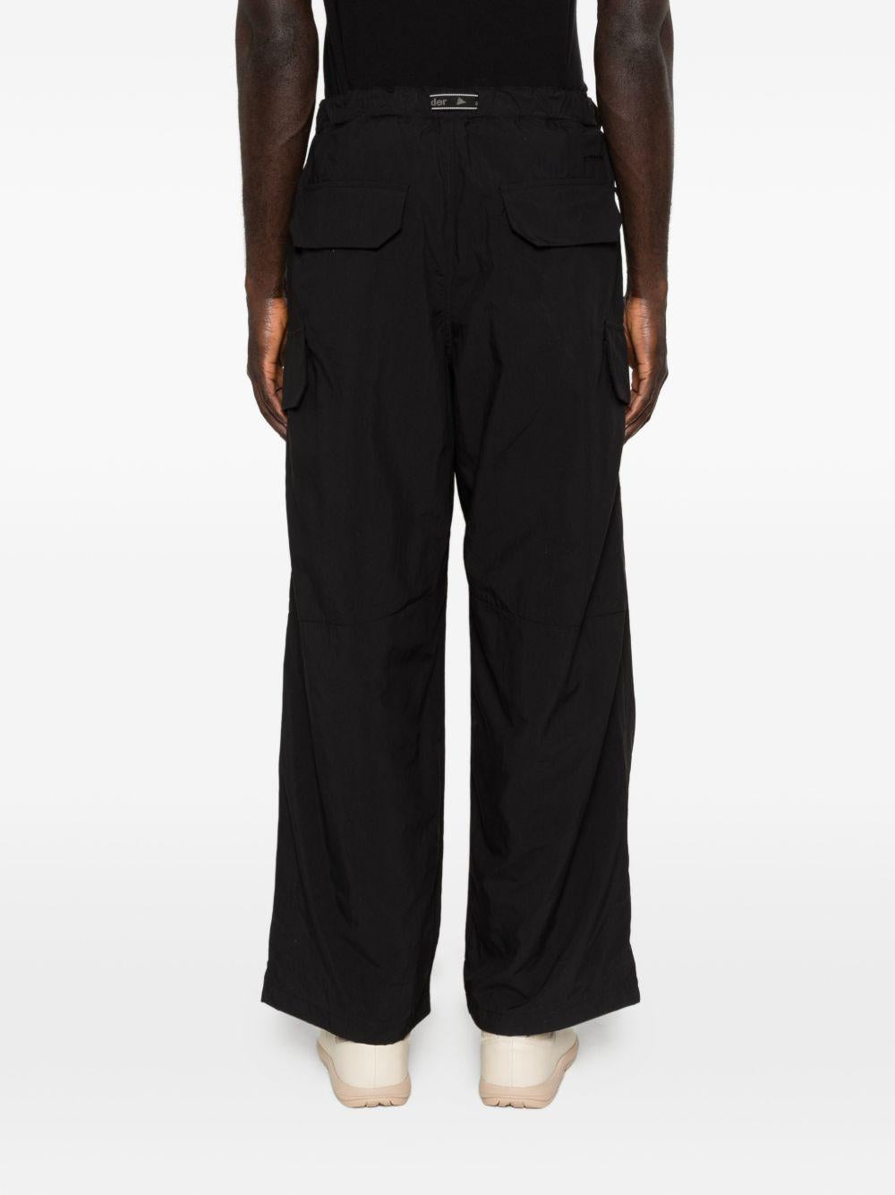 Pantaloni con tasche in nero and Wander - uomo 