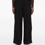 Pantaloni con tasche in nero and Wander - uomo 
