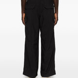 Pantaloni con tasche in nero and Wander - uomo 