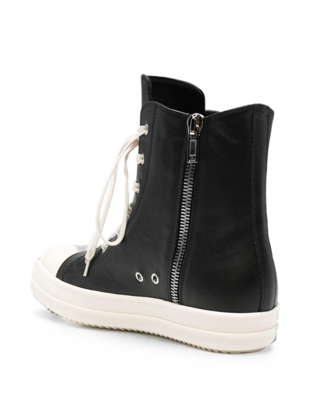Sneakers alte in pelle in nero 