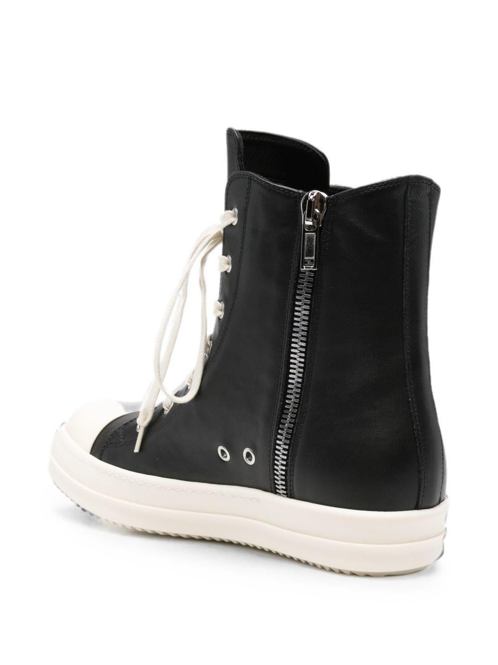 Sneakers alte in pelle in nero 