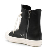 Sneakers alte in pelle in nero 