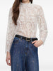 Blusa in pizzo in bianco