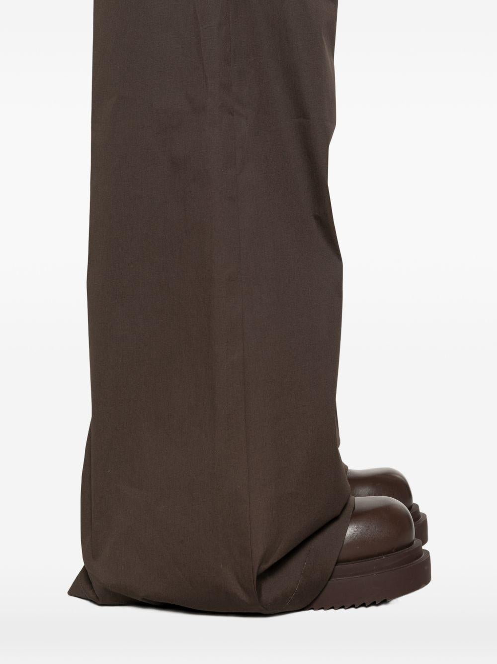 Pantaloni con dettaglio zip in grigio Rick owens - uomo 