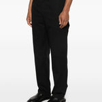 Pantaloni Rainier in nero Simkhai - uomo 