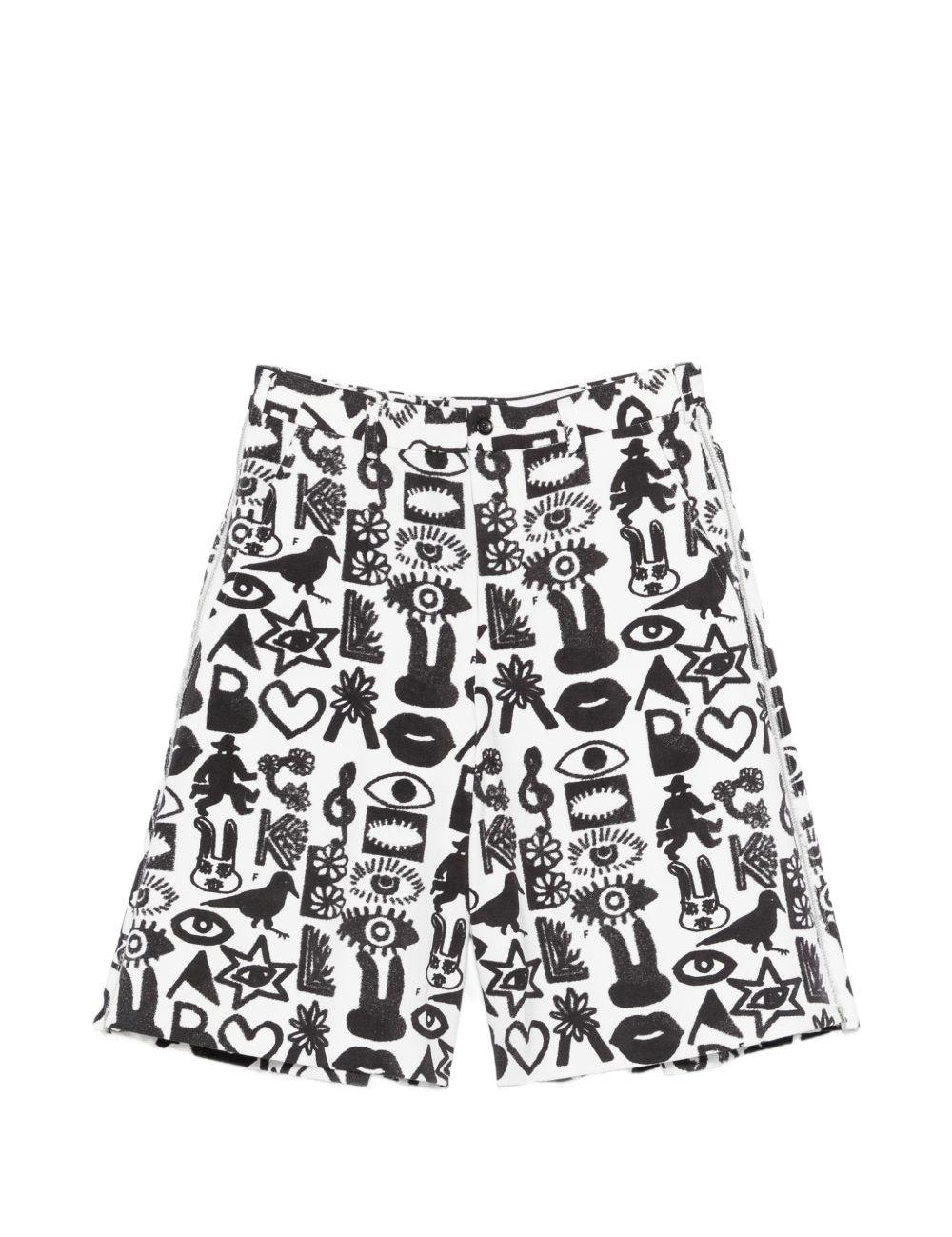 Shorts con stampa Fantasia in nero e bianco Comme des garcons black - unisex 