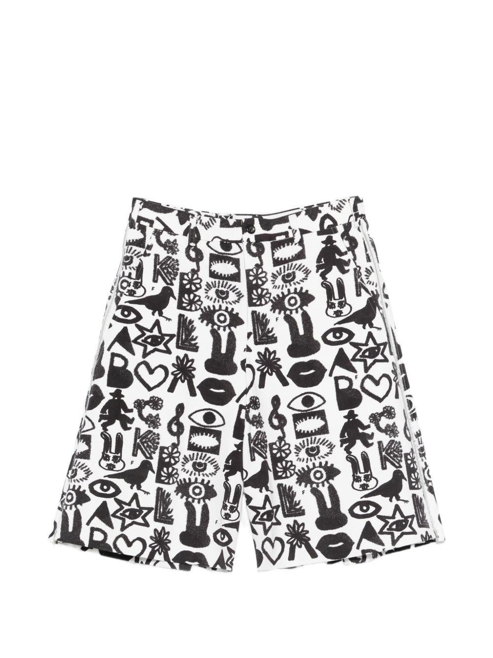 Shorts con stampa Fantasia in nero e bianco Comme des garcons black - unisex 