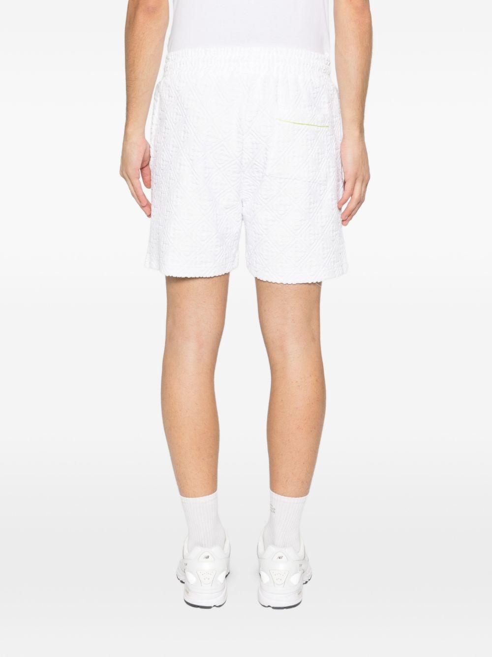 Shorts con monogramma in bianco Casablanca - uomo 