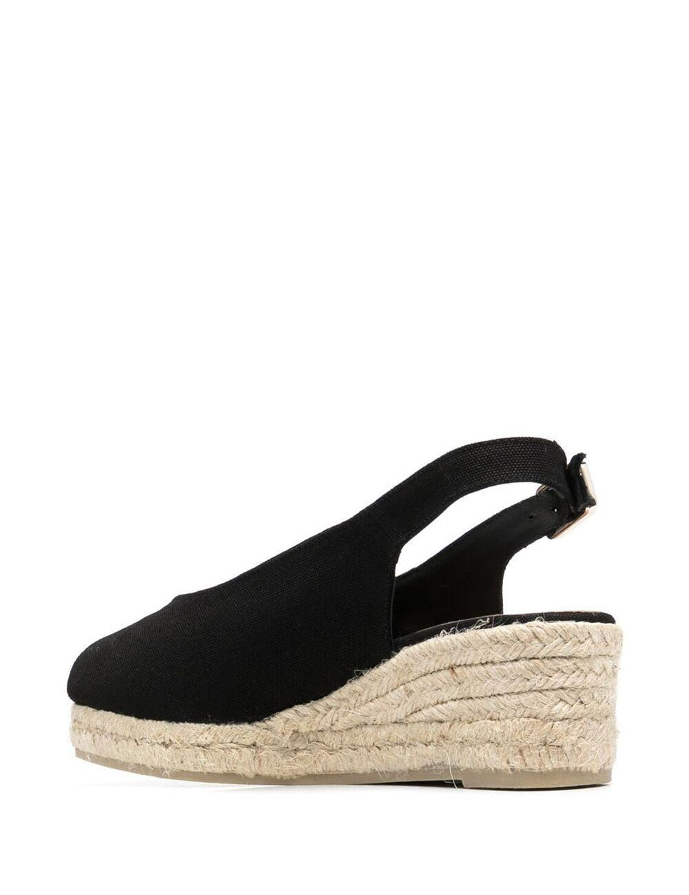 Sandali con zeppa in nero - donna 