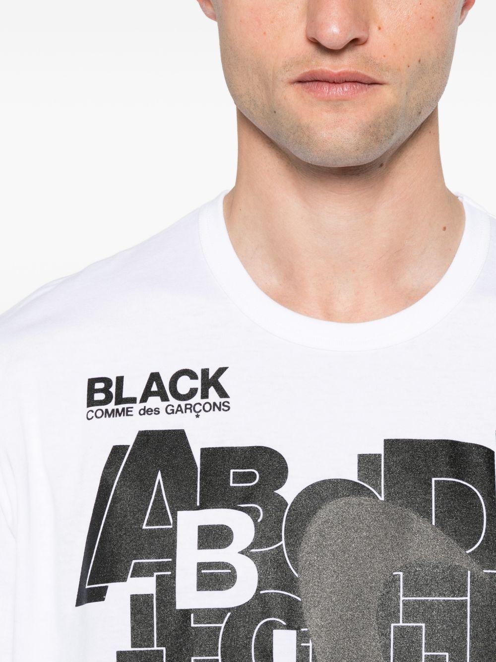T-shirt con stampa in bianco e nero  Comme Des Garçons Black  x Nike - unisex 