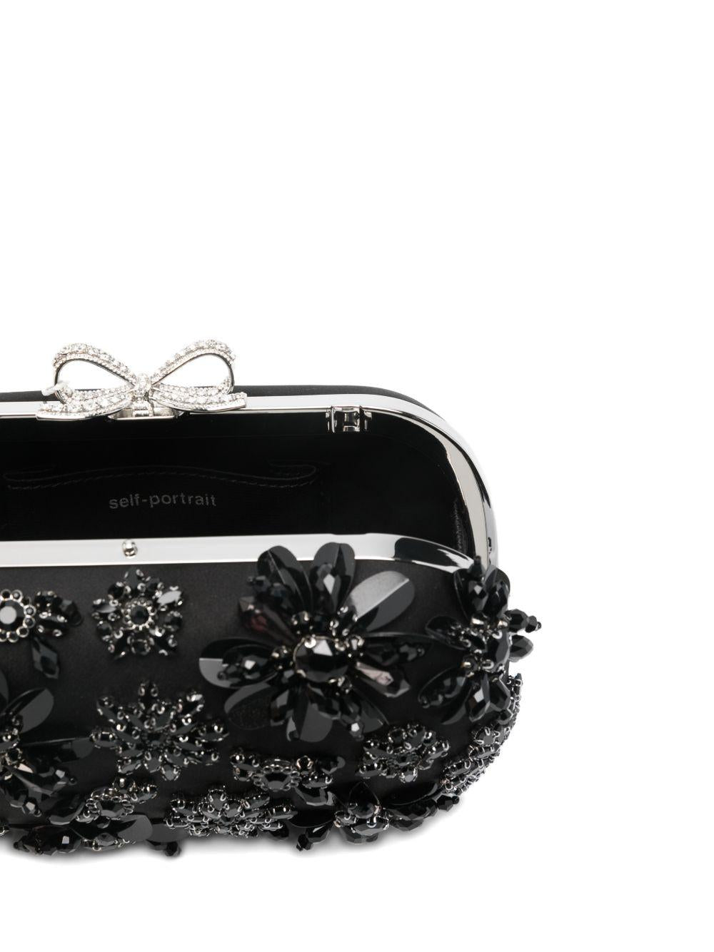 Clutch con decorazione in nero Self-Portrait - donna 