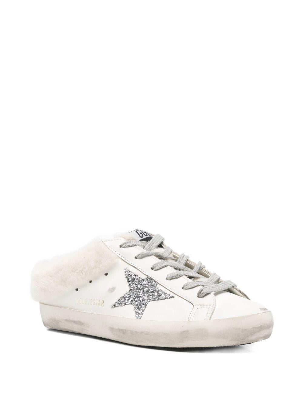 Mules con shearling super star in bianco 