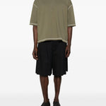 T-shirt con cuciture a contrasto in verde Comme des garcons homme - uomo 