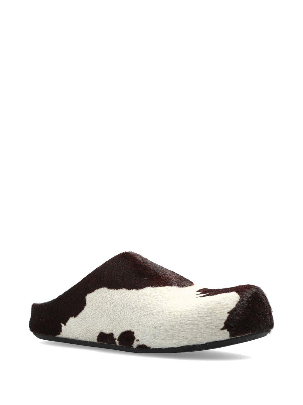 Mules fussbett con stampa mucca in bianco e marrone 