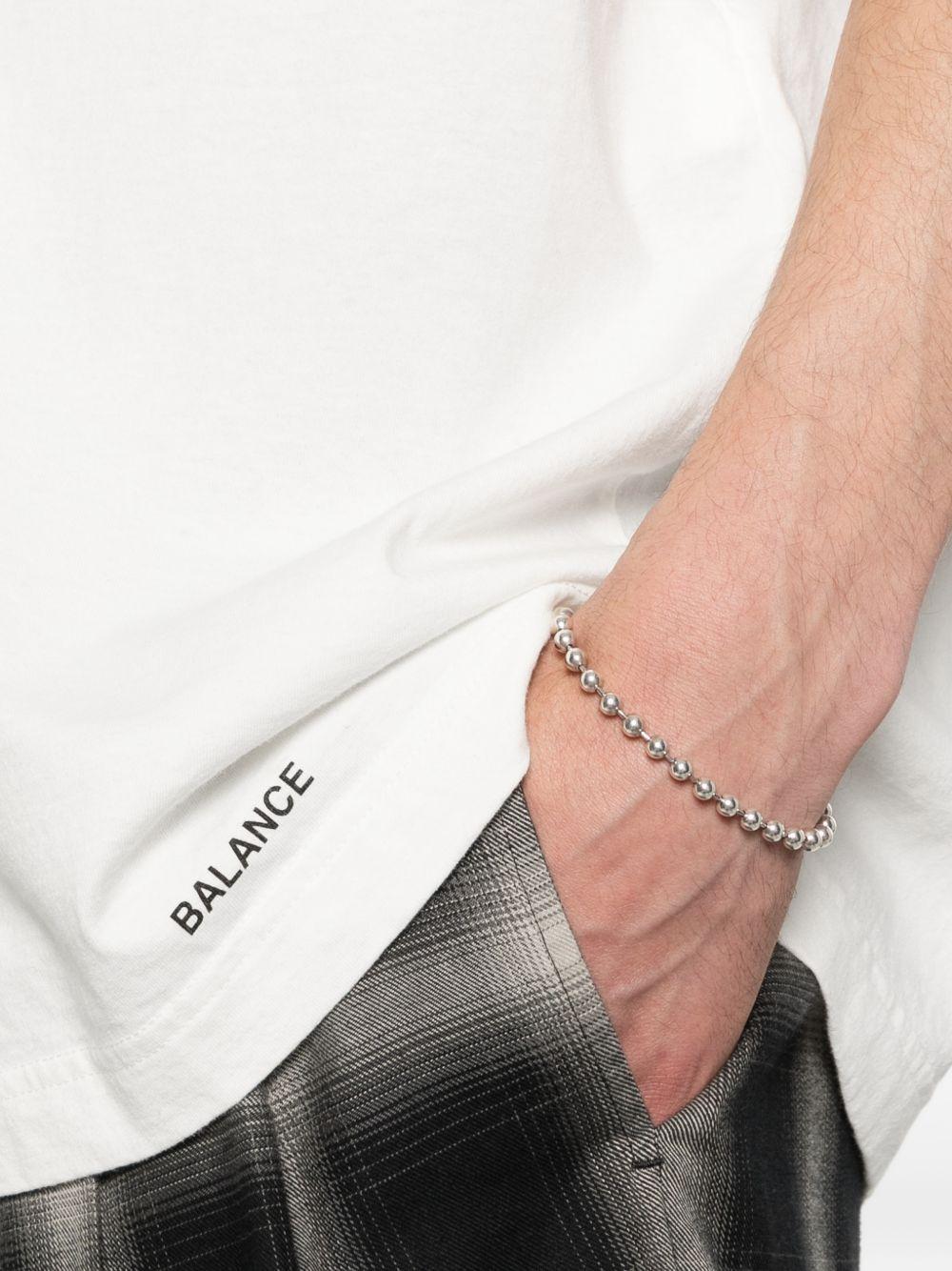 T-shirt con tasca sul petto in bianco Undercover - uomo 