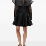 Abito corto a pois con ruches in nero Ganni - donna 