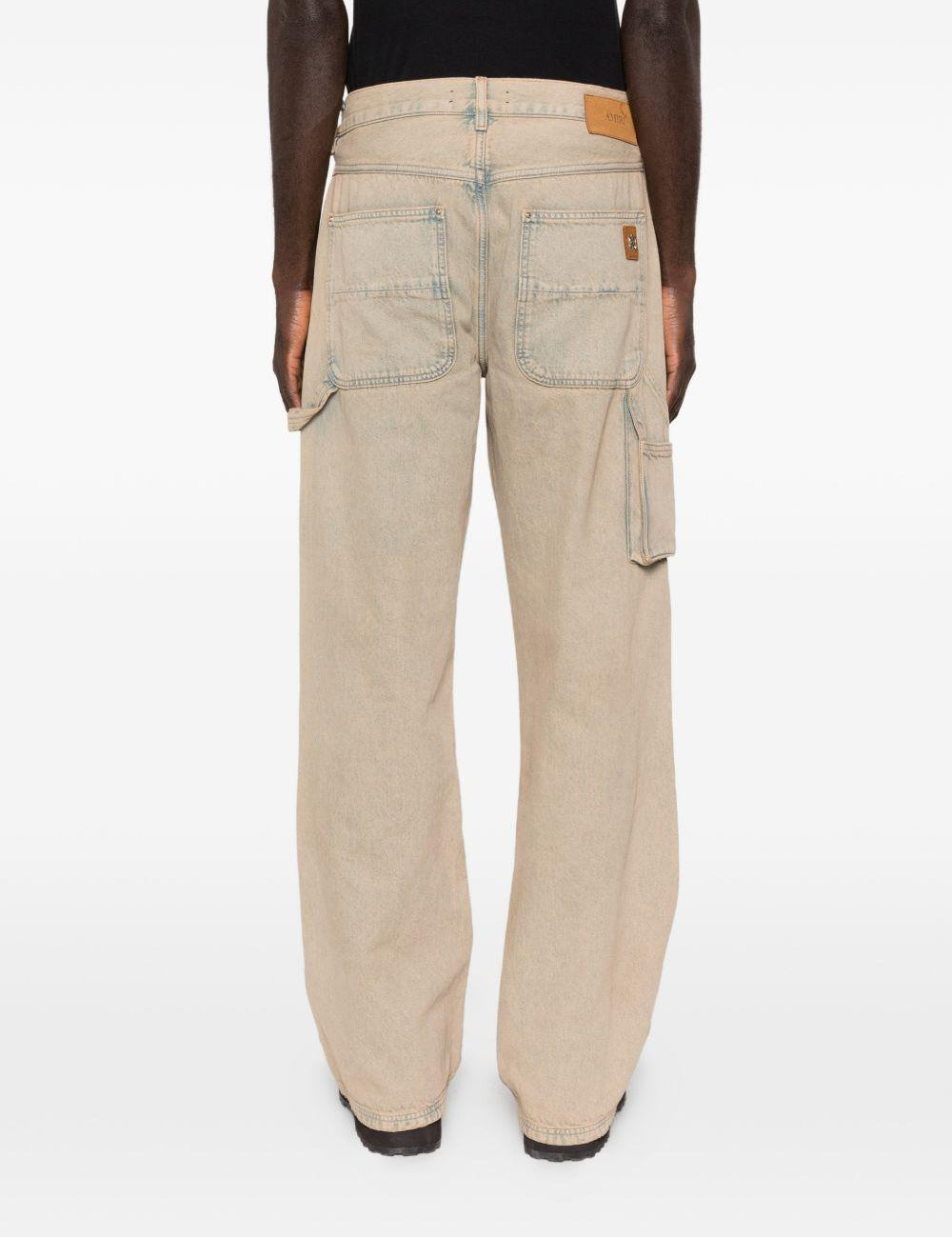 Jeans con tasche in beige Amiri - uomo 