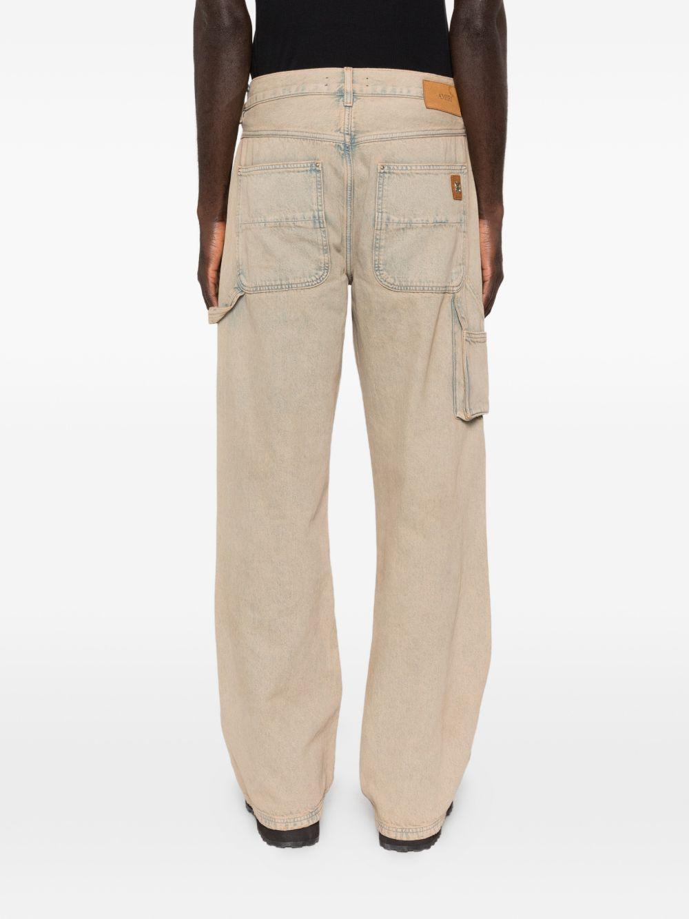 Jeans con tasche in beige Amiri - uomo 